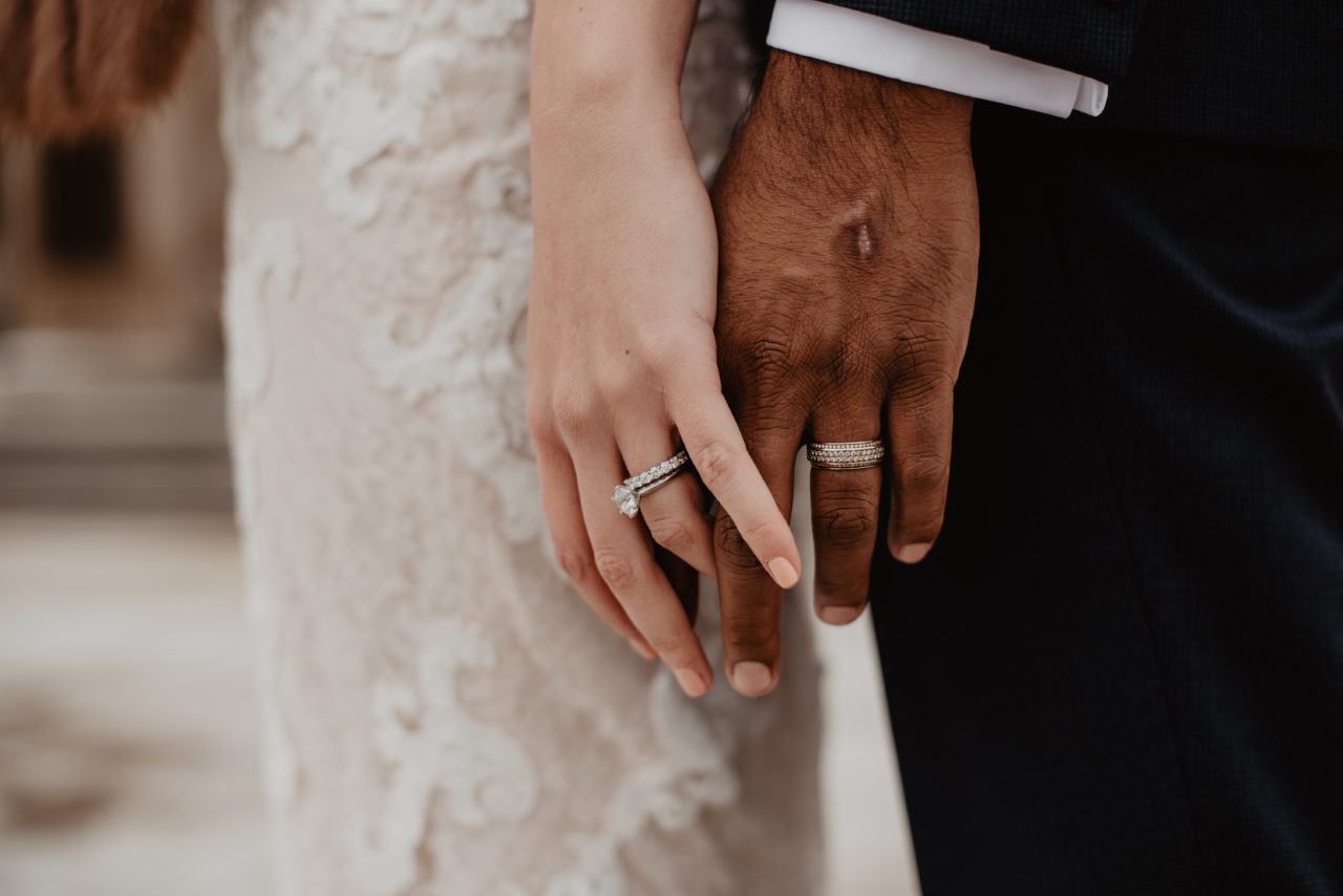 two-persons-wearing-silver-colored-rings-3585798